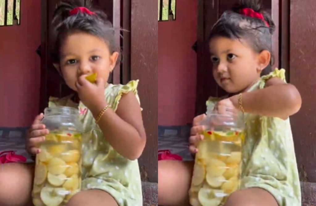 Child eating salted mango viral video